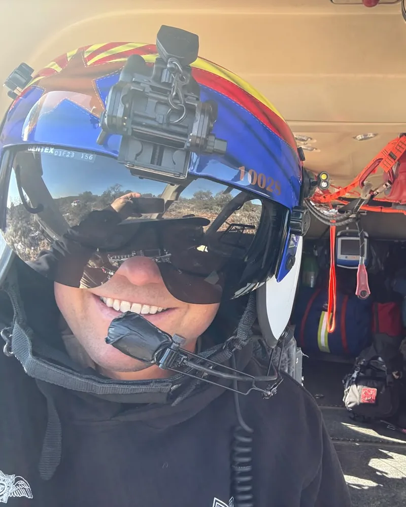 Jake Arnold, owner of Desert Elite Cleaners, in his flight helmet